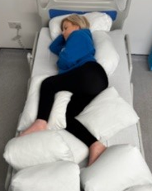 Patient on side in bed